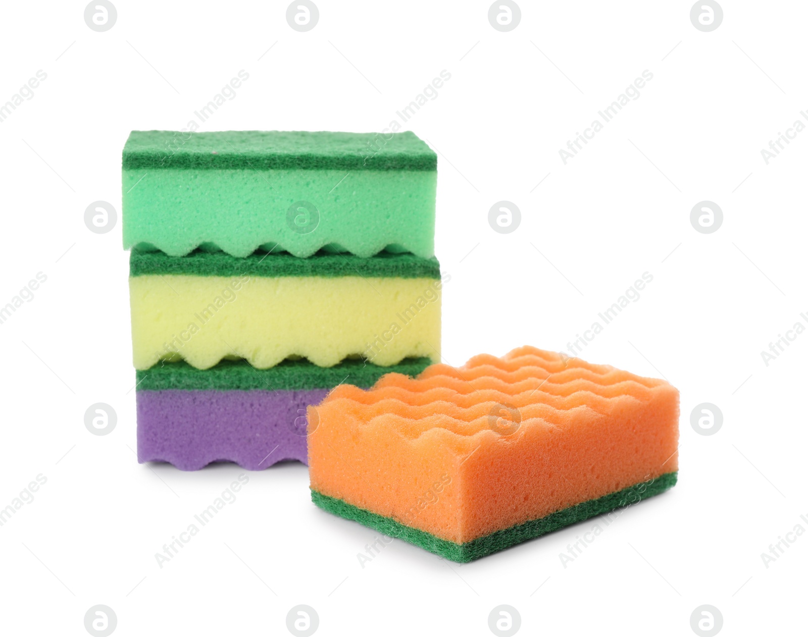 Photo of Bright cleaning sponges with abrasive scourers on white background