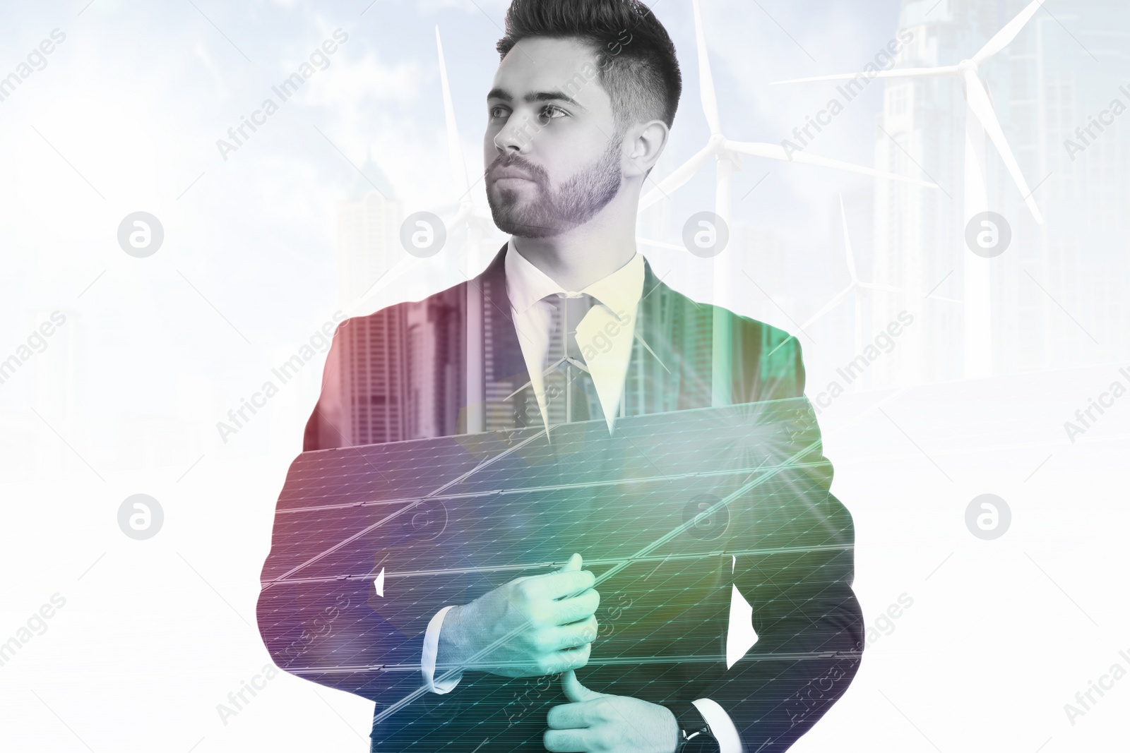 Image of Multiple exposure of businessman, wind turbines and solar panels installed outdoors. Alternative energy source