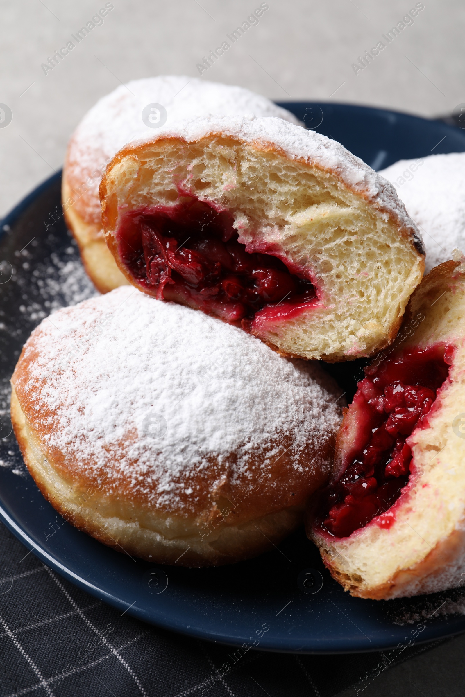 Photo of Delicious sweet buns with cherries on table, closeup