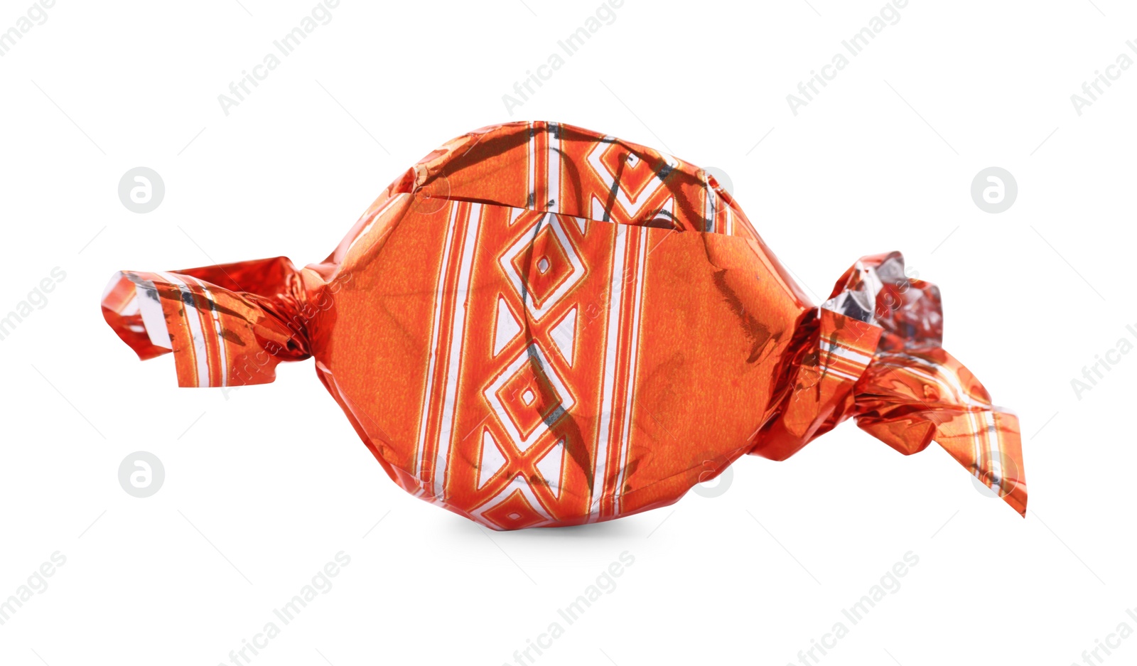 Photo of Candy in orange wrapper isolated on white