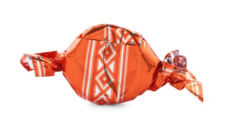 Candy in orange wrapper isolated on white