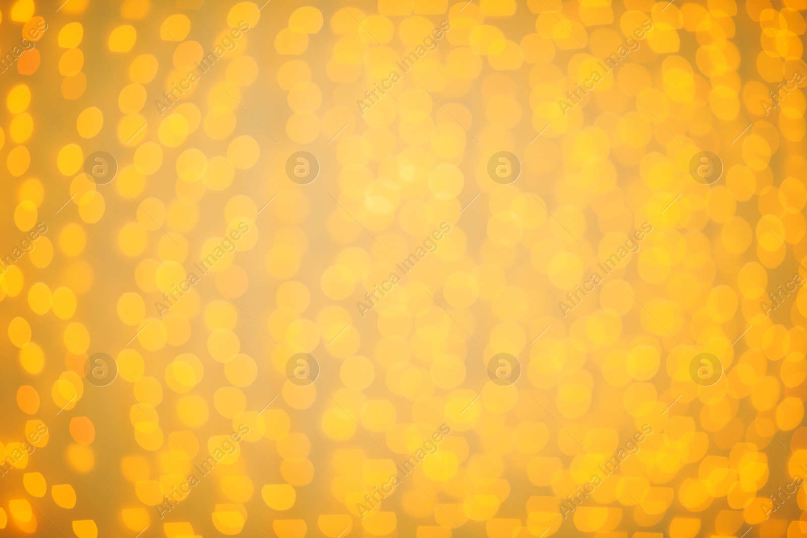 Photo of Beautiful gold lights as background. Bokeh effect