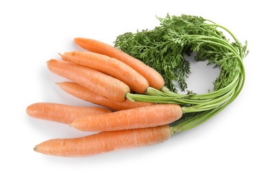 Photo of Ripe carrots on white background. Healthy diet