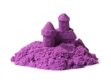 Photo of Castle made of purple kinetic sand isolated on white