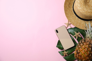 Photo of Flat lay composition with beach objects on pink background. Space for text