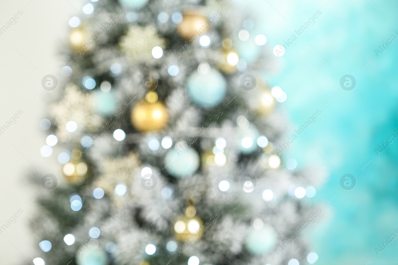 Photo of Blurred view of beautiful Christmas tree with lights