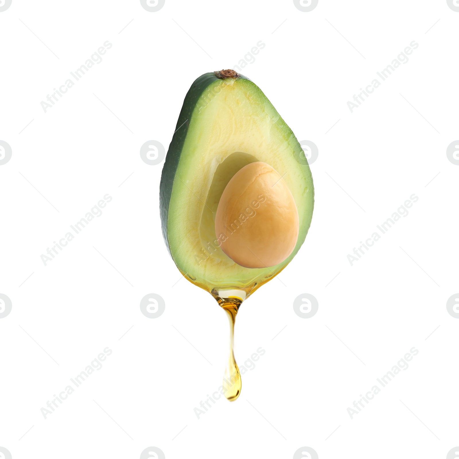 Image of Fresh avocado with dripping oil on white background