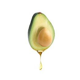 Image of Fresh avocado with dripping oil on white background