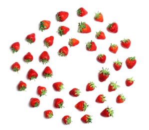 Photo of Composition with ripe red strawberries on light background