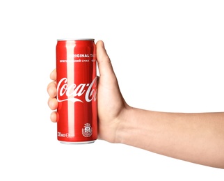 MYKOLAIV, UKRAINE - NOVEMBER 15, 2018: Man holding Coca Cola can on white background, closeup