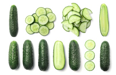 Image of Set with sliced cucumbers on white background, top view