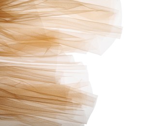 Beautiful beige tulle fabric on white background, top view. Space for text