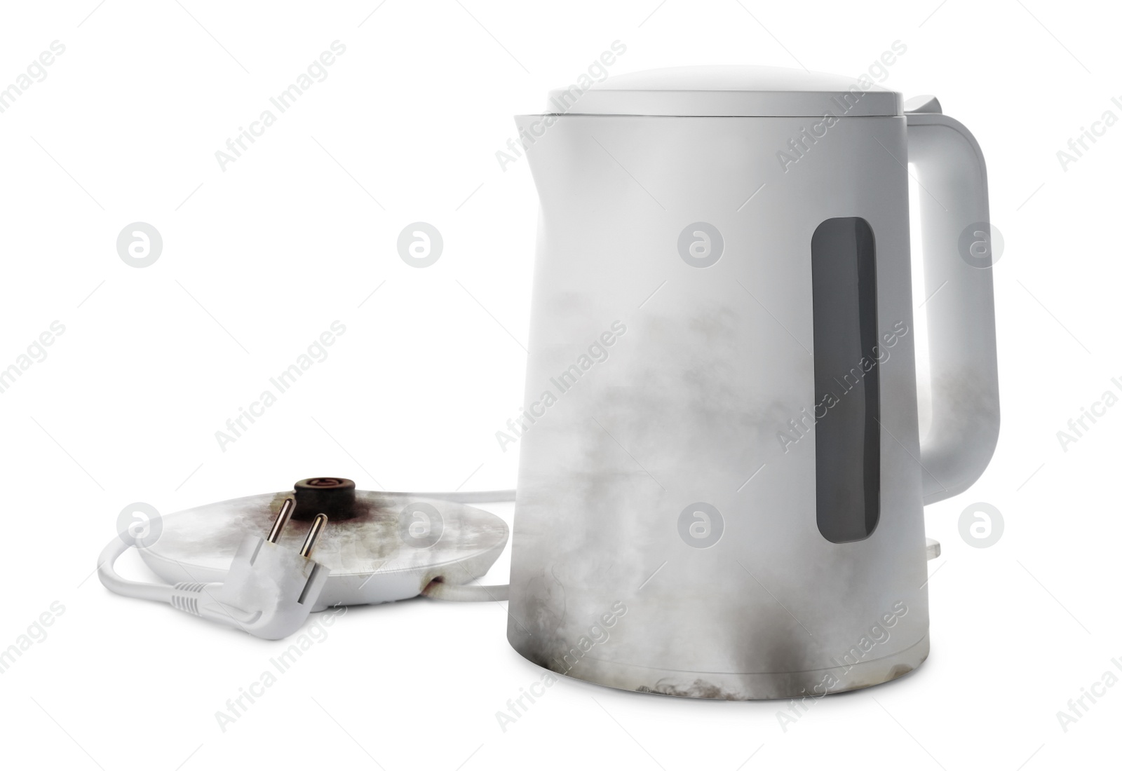 Image of Burnt electric kettle with base and plug on white background