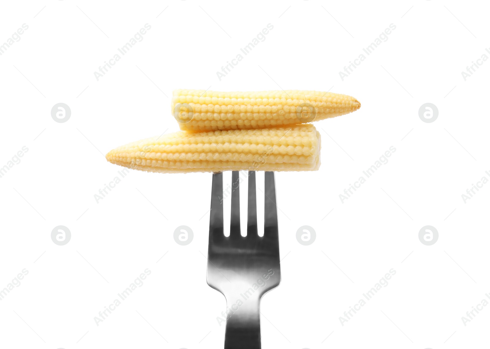 Photo of Pickled baby corn on fork isolated on white