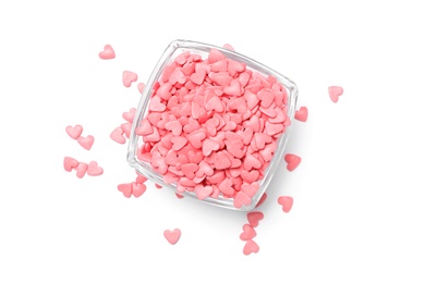 Photo of Sweet candy hearts in bowl on white background, top view