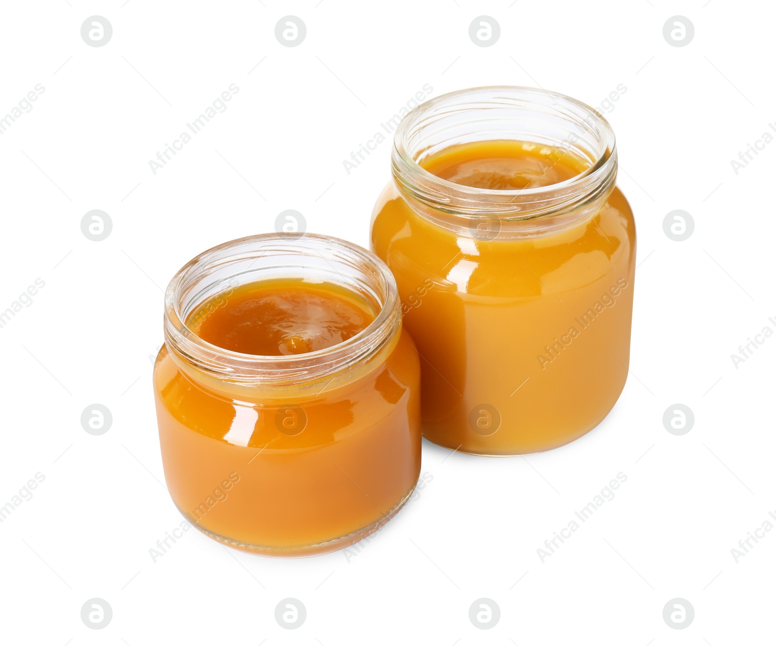 Photo of Baby food. Different healthy puree in jars isolated on white