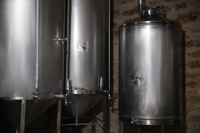 Photo of Steel tanks for wine fermentation at factory