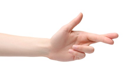 Photo of Woman crossing her fingers on white background, closeup