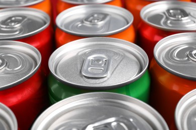 Photo of Energy drink in cans, closeup. Functional beverage
