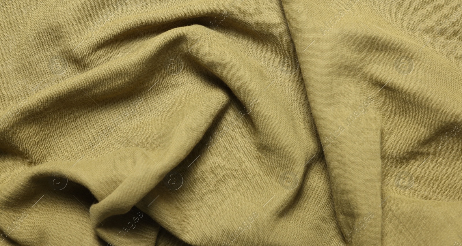Photo of Texture of olive crumpled fabric as background, top view