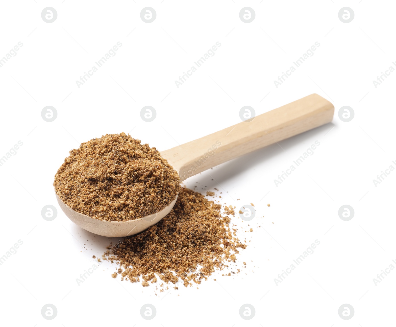 Photo of Wooden spoon of aromatic caraway (Persian cumin) powder isolated on white