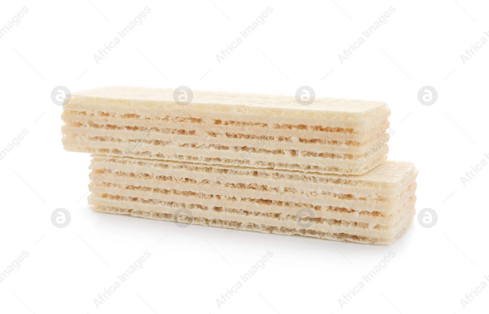 Photo of Delicious crispy wafers on white background. Sweet food