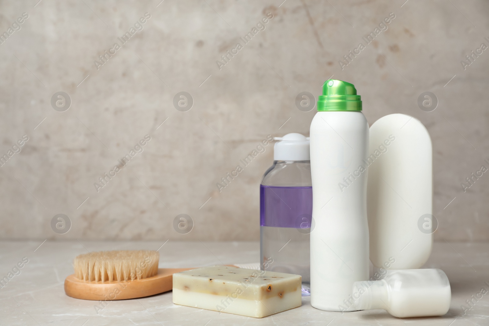 Photo of Deodorant and toiletries on table. Personal hygiene