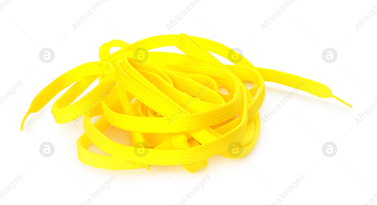 Photo of Yellow shoe laces isolated on white. Stylish accessory