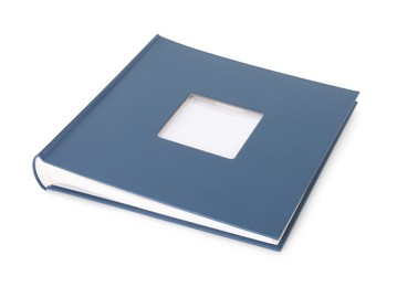 Photo of Blue closed photo album isolated on white