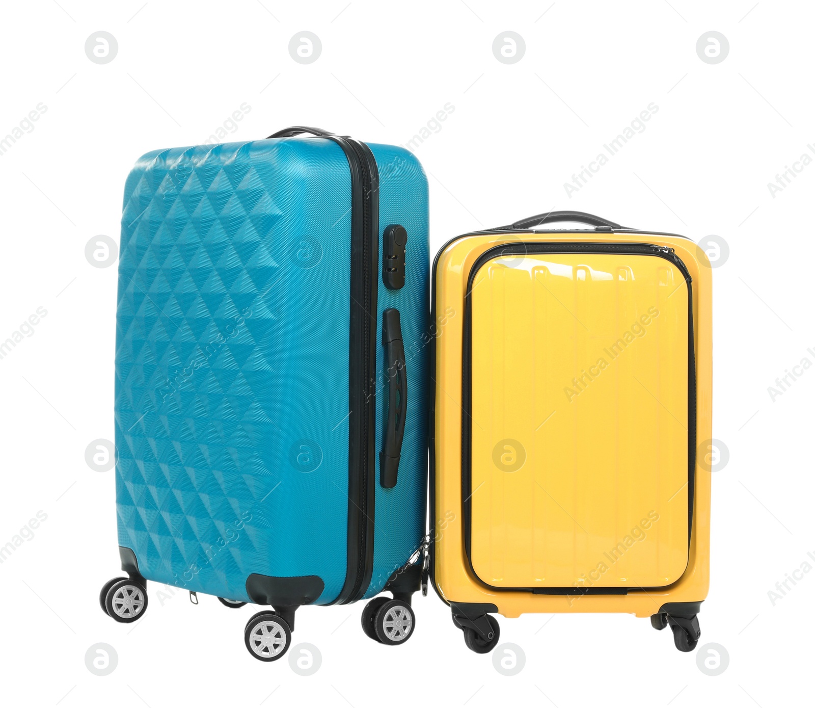 Photo of New suitcases packed for journey on white background