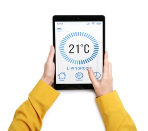 Image of Woman using tablet to control heating system in house on white background, closeup