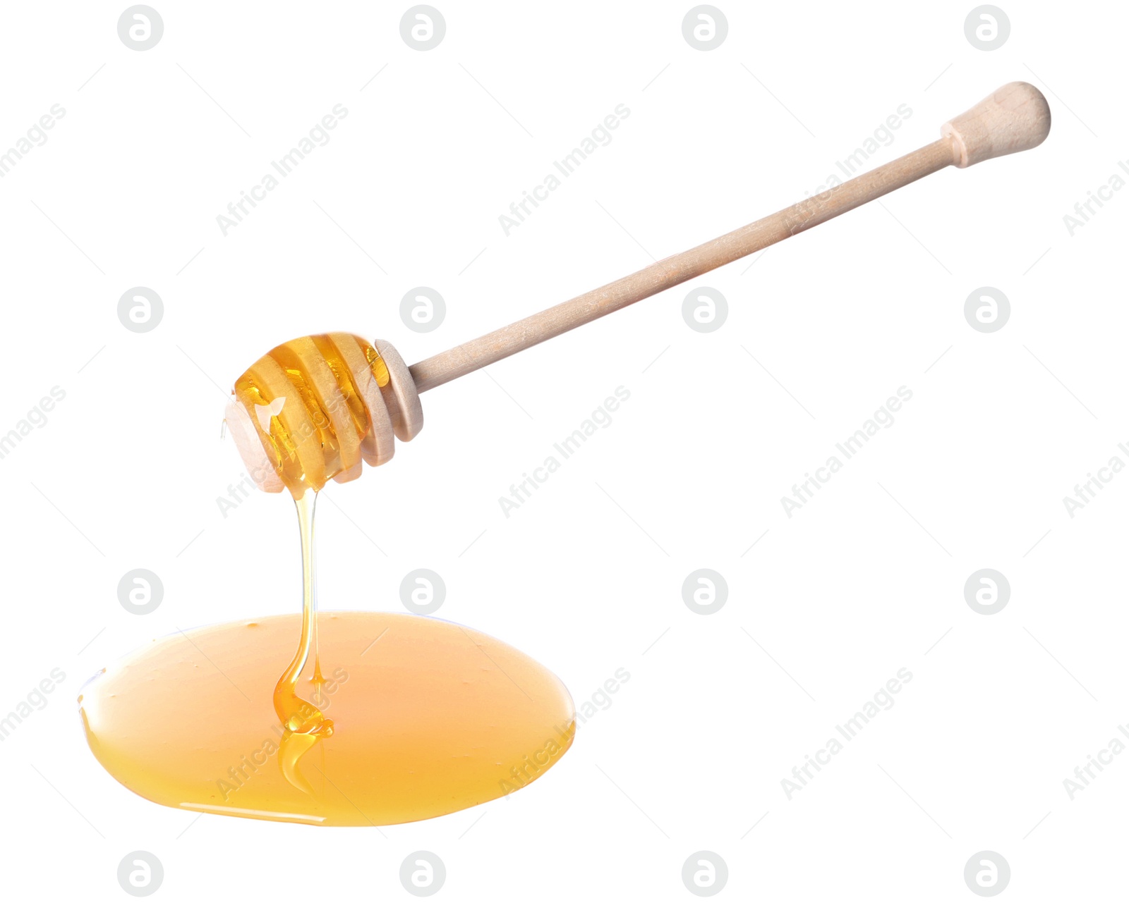 Photo of Fresh honey dripping from dipper on white background