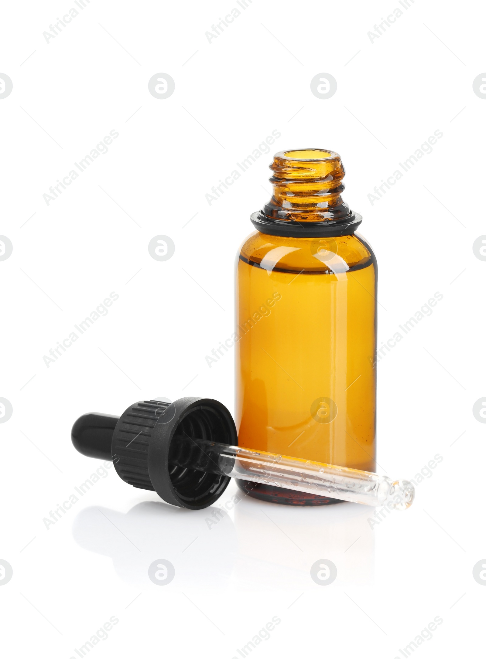 Photo of Glass bottle and pipette with tincture isolated on white