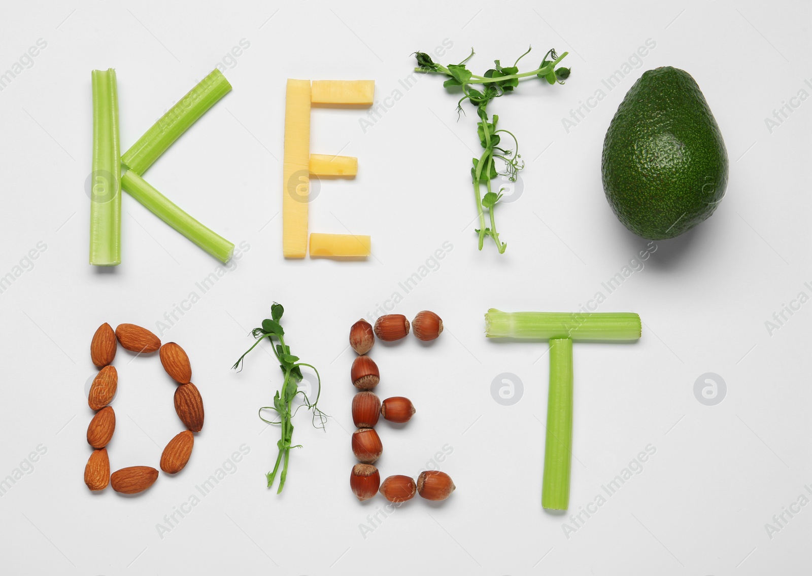 Photo of Phrase Keto Diet made with different on white background, flat lay