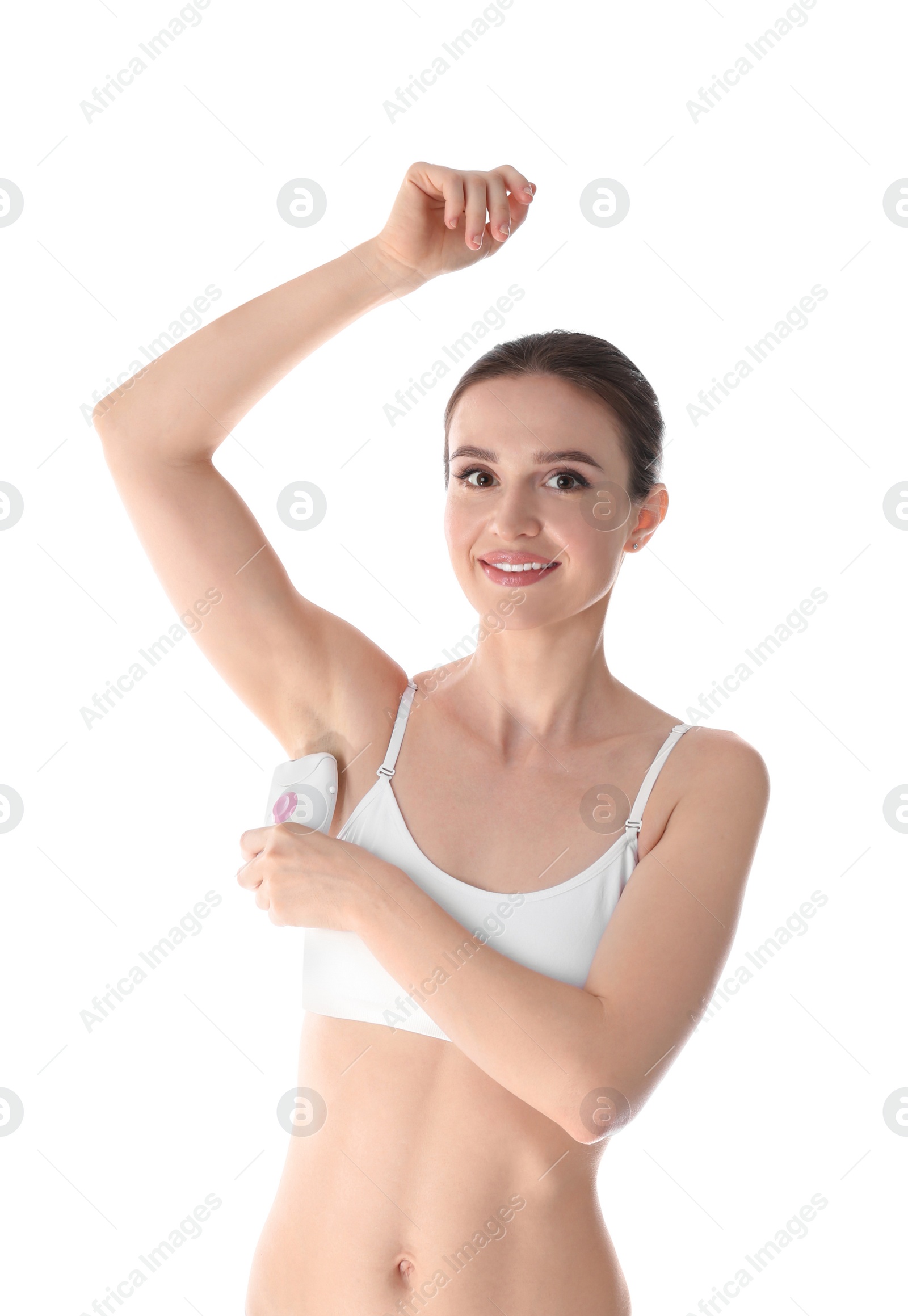 Photo of Smiling young woman doing armpit epilation procedure on white background