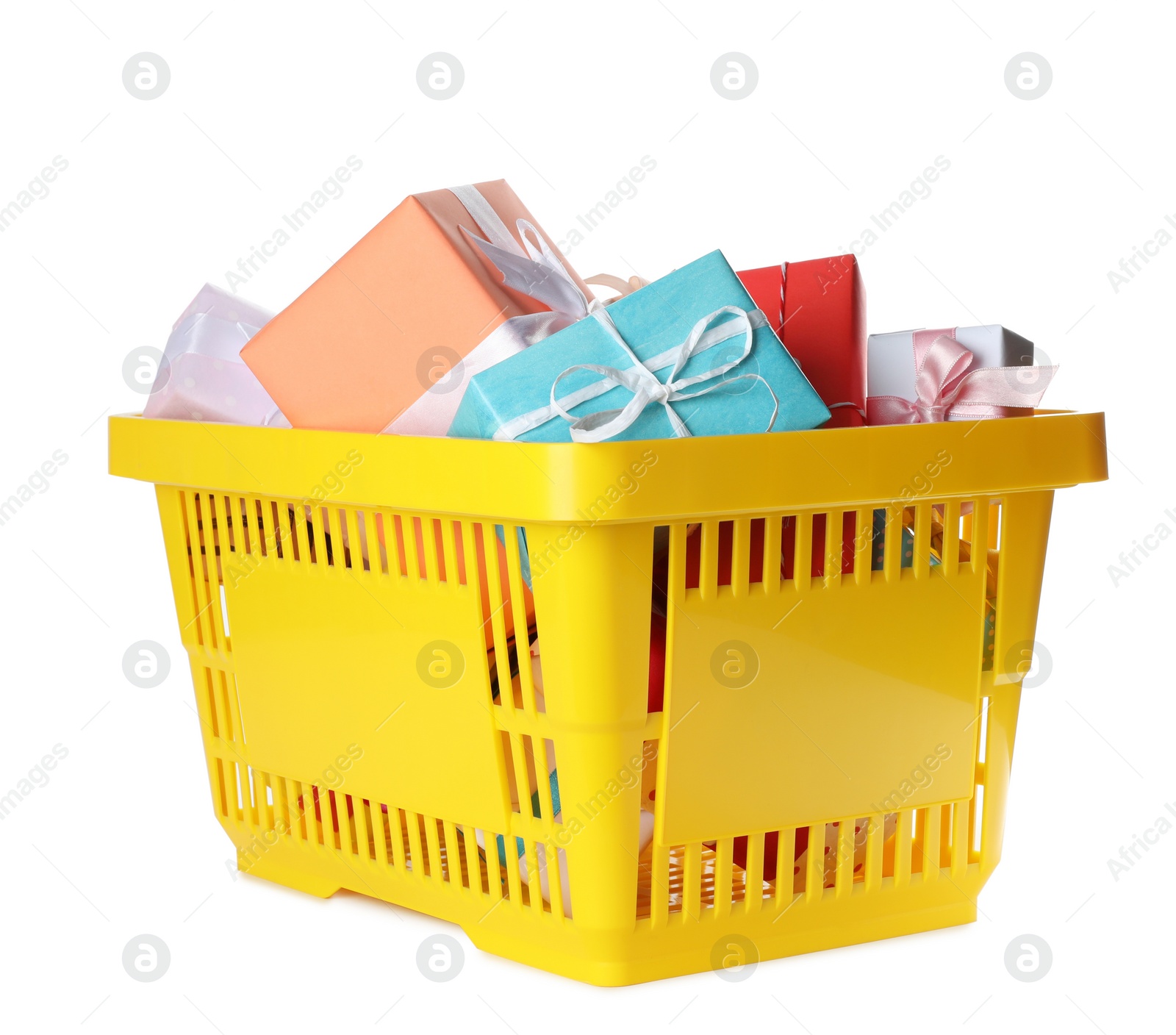 Photo of Shopping basket full of gift boxes on white background