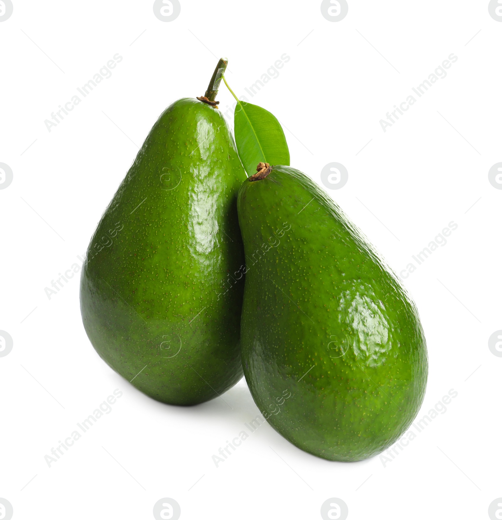 Photo of Ripe fresh avocados on white background