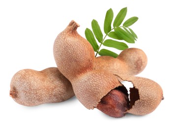 Image of Delicious ripe tamarinds on white background. Exotic fruit