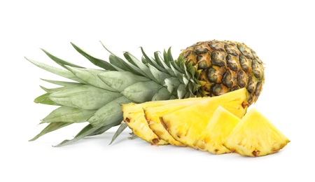 Whole and cut juicy pineapples isolated on white