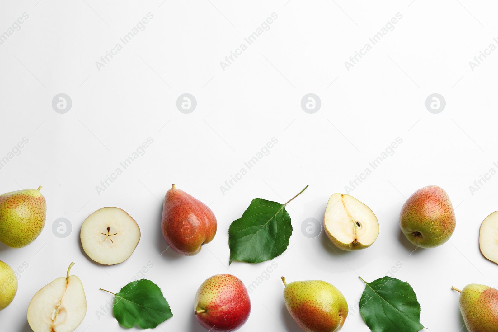 Photo of Ripe juicy pears on white background, top view