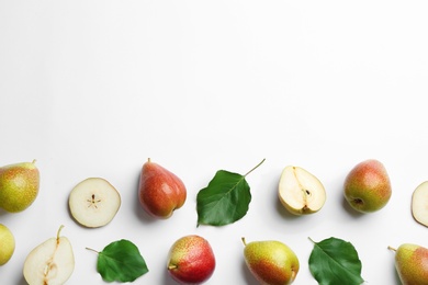 Photo of Ripe juicy pears on white background, top view