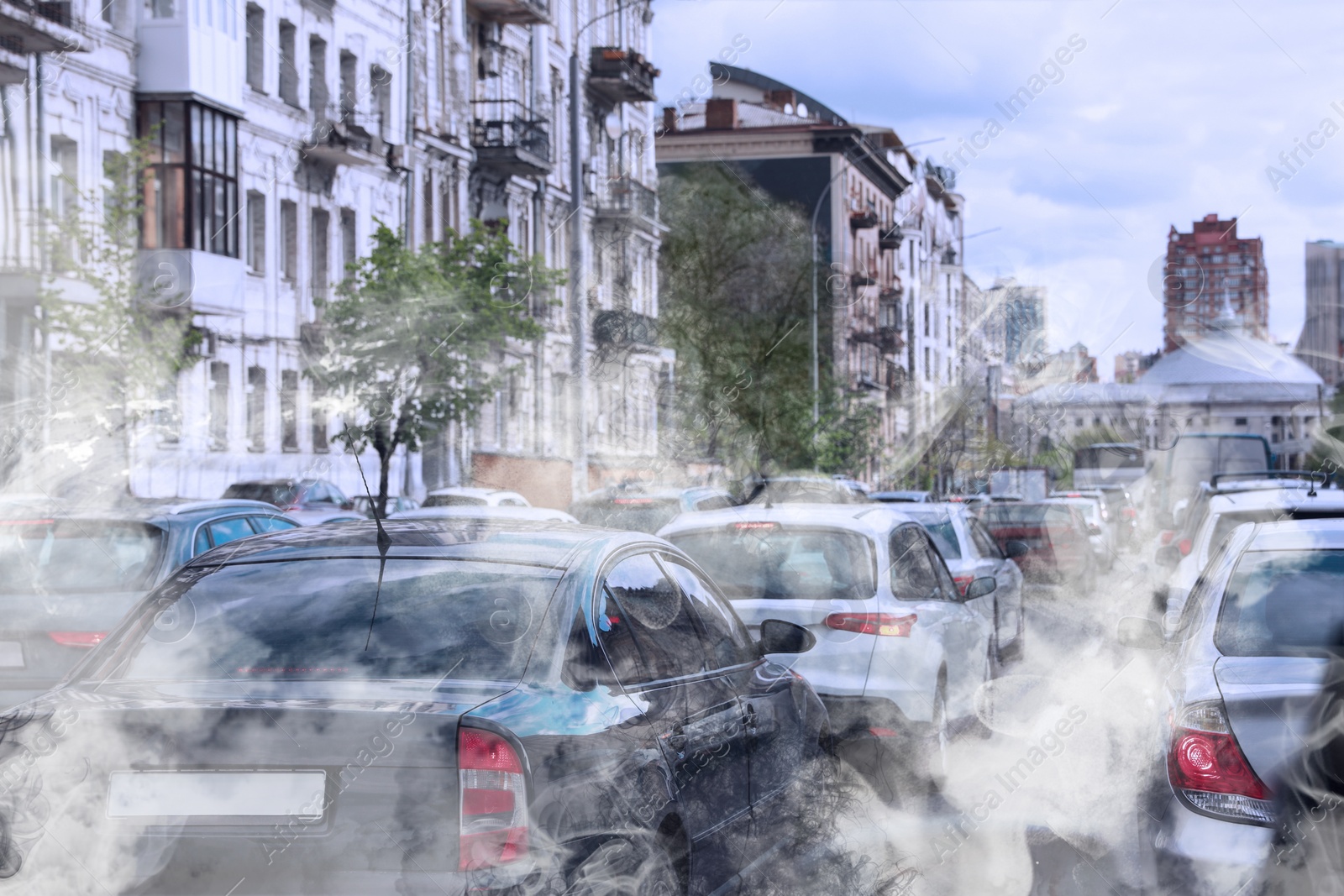 Image of Environmental pollution. Air contaminated with fumes in city. Cars surrounded by exhaust on road