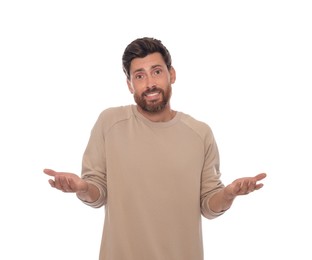 Photo of Embarrassed man in pullover on white background