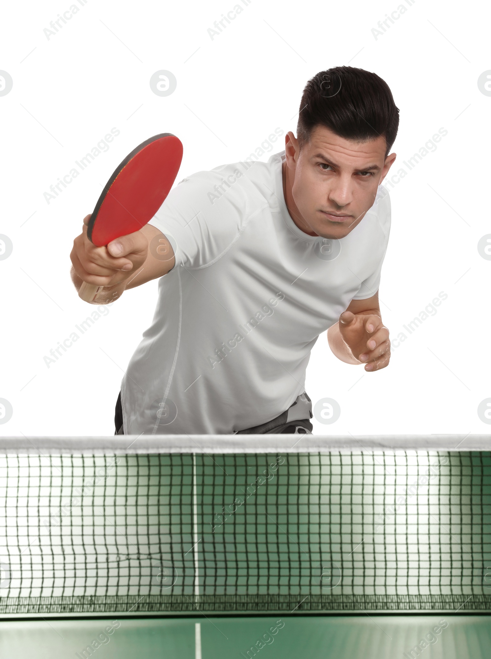 Photo of Handsome man playing ping pong on white background