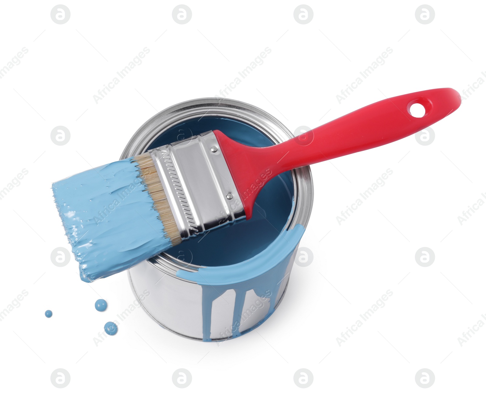 Photo of Can of light blue paint and brush isolated on white, view from above