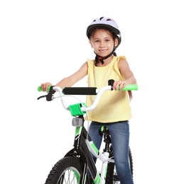 Photo of Portrait of cute little girl with bicycle on white background