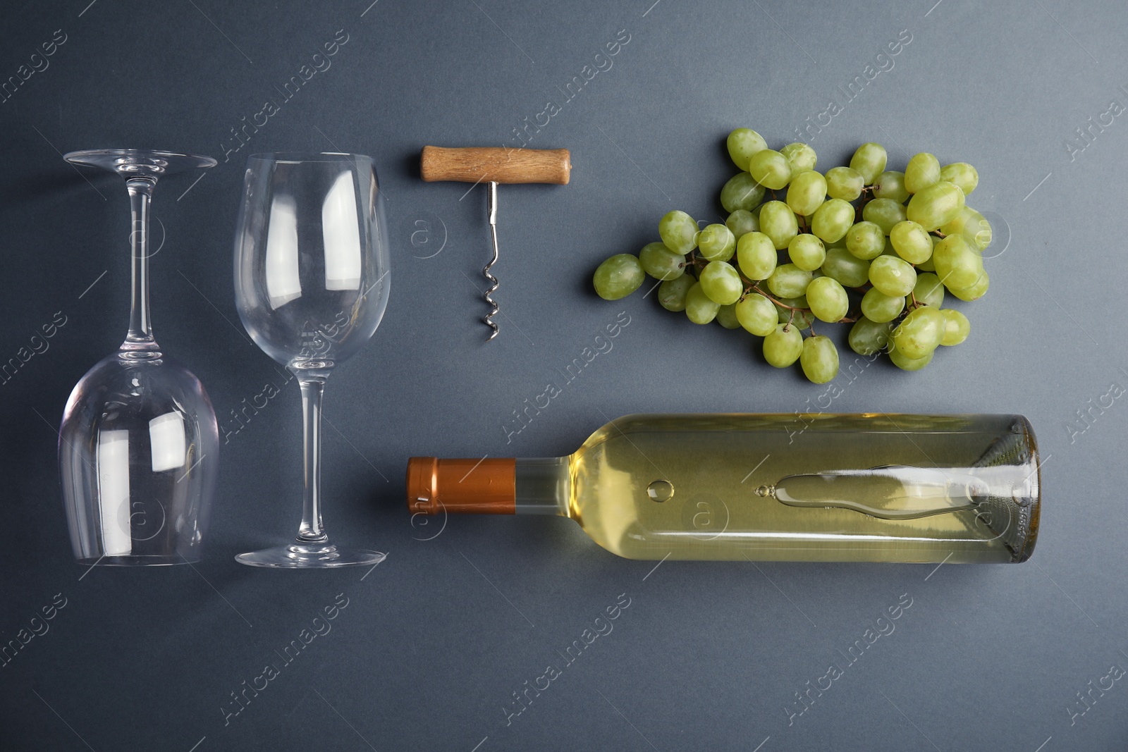 Photo of Flat lay composition with fresh ripe juicy grapes on color background