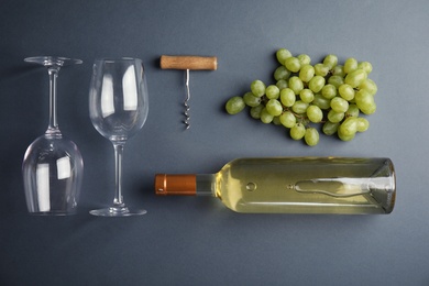 Photo of Flat lay composition with fresh ripe juicy grapes on color background
