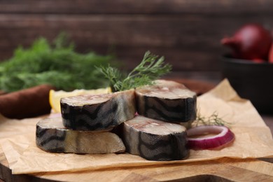 Photo of Slices of tasty salted mackerel and onion on table, closeup
