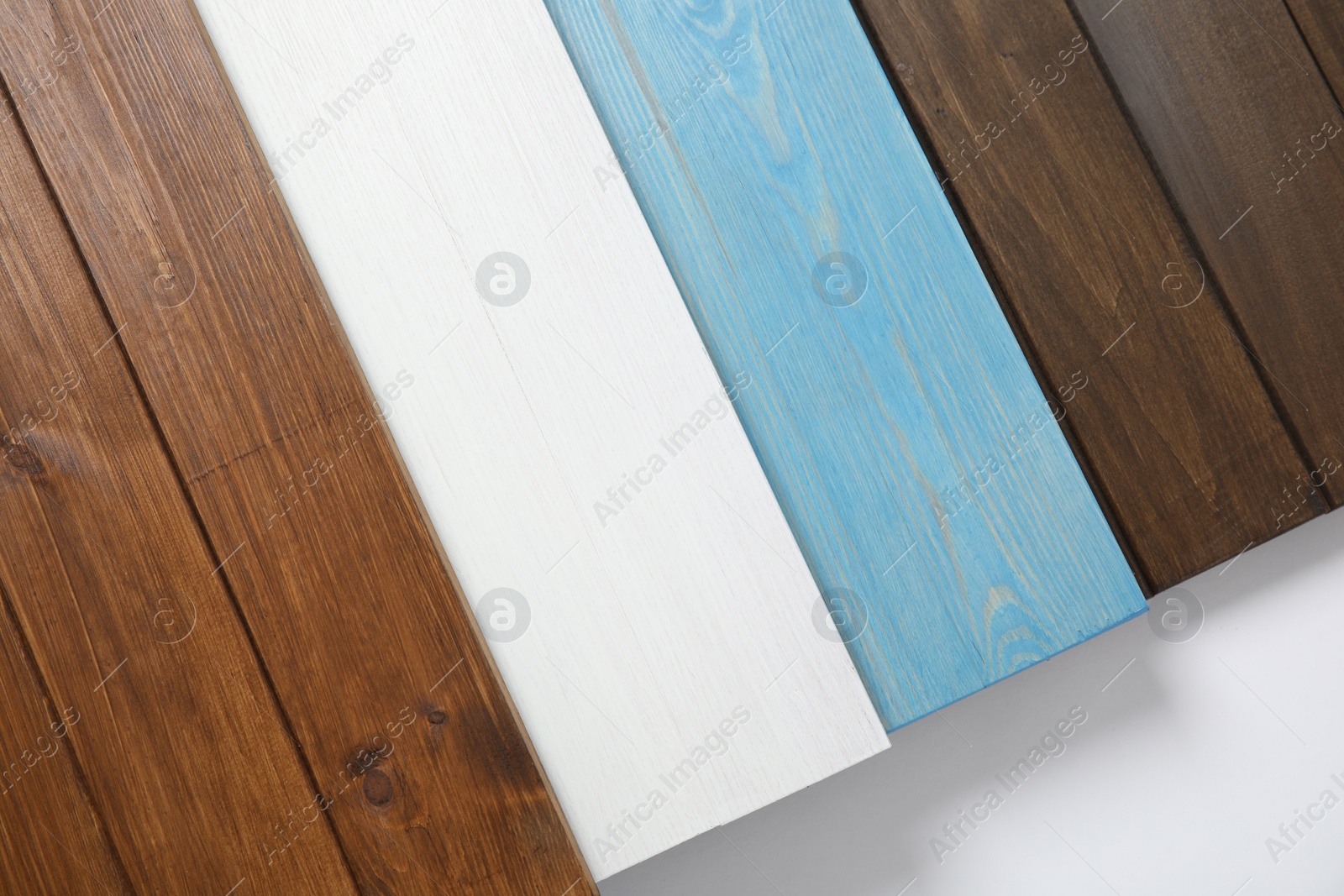 Photo of Different wooden surfaces for photography on white background, top view